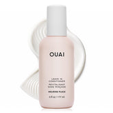 OUAI leave in conditioner front packaging shows bottle and label, easy identification and benefits