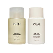 OUAI set frontal en tamaño viaje mostrando envases compactos y fácil transporte