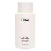 OUAI bottle front packaging showing product and easy-grip benefit