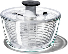 OXO glass salad spinner front view shows elegant bowl and easy serving