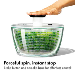 OXO spinner in use washing lettuce for quick, even drying benefit