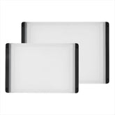 OXO Good Grips vista frontal del set mostrando ambas tablas y beneficios organizativos