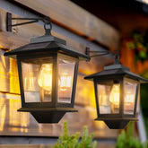 PASAMIC front view of two lanterns showing warm glow and curb appeal