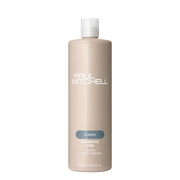 Paul Mitchell botella frente mostrando etiqueta y tamaño, limpieza visible