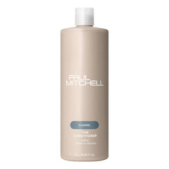 Paul Mitchell botella frontal mostrando tamaño y uso profesional