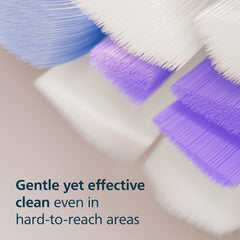 Philips Sonicare cabezal en uso limpiando delicadamente la línea de encías
