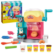 Play‑Doh vista frontal del Donut Drop Shop con accesorios incluidos, fomenta creatividad