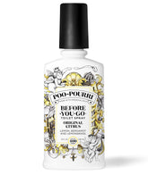 Poo-Pourri botella frontal mostrando etiqueta cítrica y tamaño claro