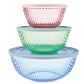 Pyrex front packaging showing colorful sculpted glass bowls and lids, durable appeal