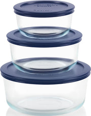 Pyrex vista frontal del set con tapas azules útil para almacenar