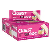 Quest envase frontal con caja de 12 barras mostrando marca y sabor
