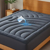 QUIETSEA front view of queen mattress pad showing fitted skirt and smooth quilted top for comfort