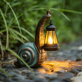 QZJDDZSW snail front view showing decorative lantern and inviting glow