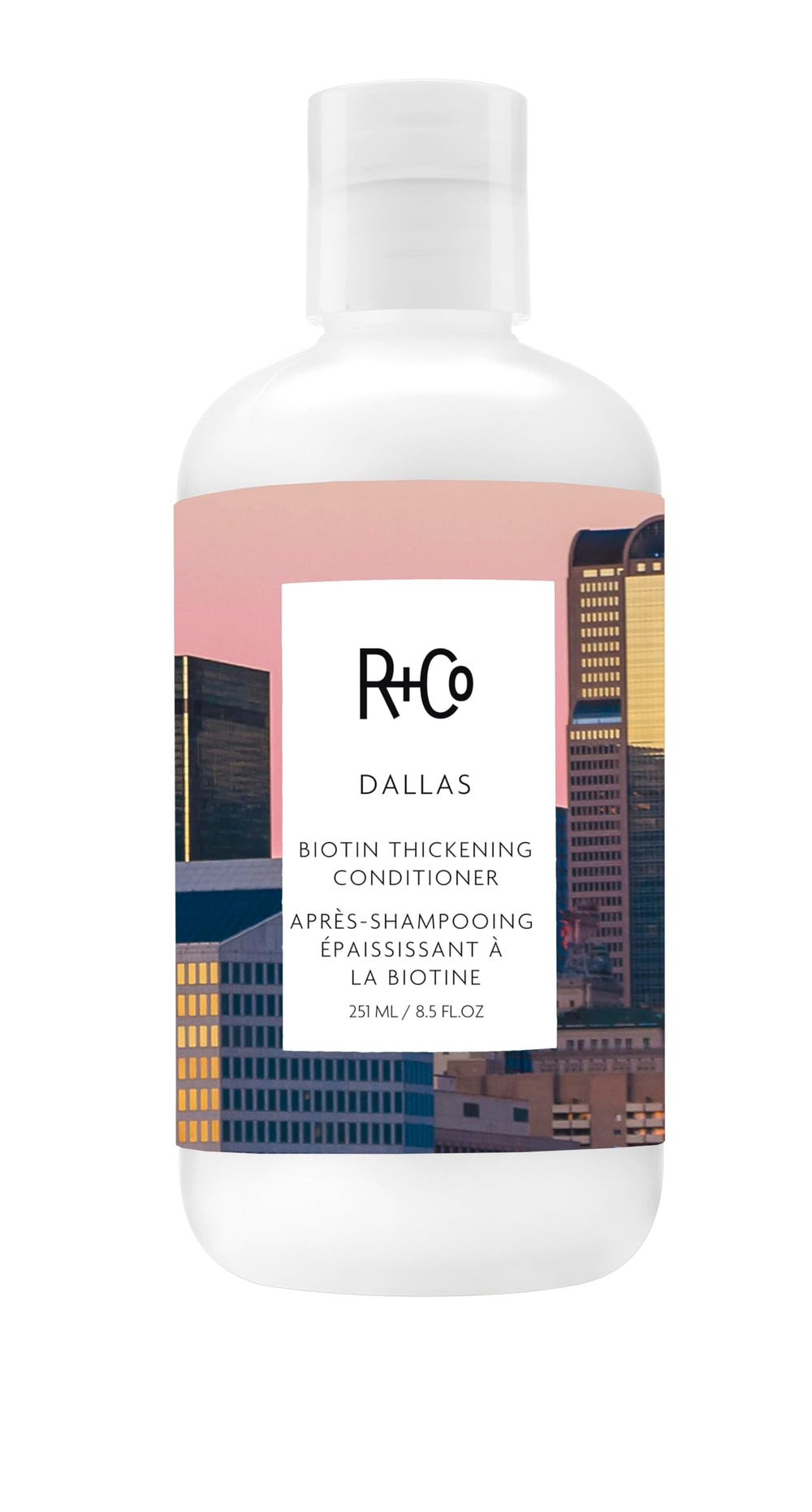 R+Co Dallas vista frontal del envase con diseño profesional y beneficio volumizante