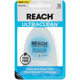 REACH empaque frontal mostrando hilo dental y beneficio limpieza eficaz