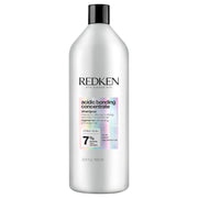 Redken Acidic Bonding Concentrate shampoo frente del envase mostrando tamaño profesional y beneficio de reparación