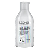 Redken front bottle view showing sleek packaging and professional strength benefits