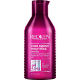 Redken front bottle showing product and benefits for maintaining color