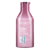 Redken bottle front view shows brand and volumizing shampoo benefits