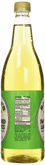 Rose's Lime Juice botella vertiendo jugo en un cóctel preparado para rapidez en barra
