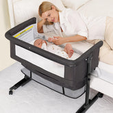 Semphis bassinet front view in dark gray showing stability and modern design