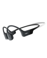 SHOKZ OpenRun Mini front view showing slim open-ear frame and secure fit benefit