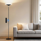 SIBRILLE torchiere front view showing modern black silhouette and even room light