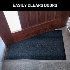 Sierra Concepts mat placed at front door catching shoes and debris at entry