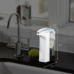 simplehuman dispensing in use over sink demonstrating touch-free activation and hygiene benefit
