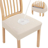 Smiry front view of seat cover showing neat fit and decorative finish, protects chairs