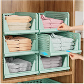 SNSLXH front view of five green stackable bins showing compact set and neat storage