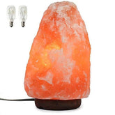 Spantik front view on wood base showing warm ambient glow and aesthetic benefit