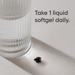 Sports Research softgel beside coin showing size and ease of swallowing benefit