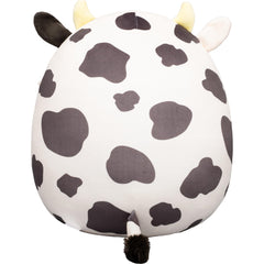 Squishmallows Colin sobre mesa de fiesta, aporta decoración alegre