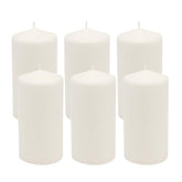 Stonebriar front packaging showing six white pillar candles and secure box, convenient gift-ready