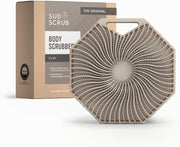 Sud Scrub cepillo frontal clay mostrando diseño ergonómico y acabado antimicrobiano