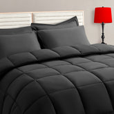 TAIMIT comforter front view showing dark grey reversible design and cozy look