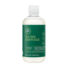 Tea Tree champú frontal mostrando etiqueta y tamaño para volumen