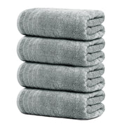 Tens Towels vista frontal del paquete mostrando las cuatro toallas y tono gris frío, ideal para decoración