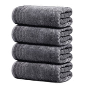 Tens Towels vista frontal del paquete gris oscuro mostrando las cuatro toallas, versátil y ahorrativa