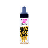 The Doux espuma CRAZYSEXYCURL frontal mostrando envase y tamaño, brillo mejorado