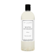 The Laundress envase frontal mostrando diseño y volumen 32 oz, limpieza eficiente