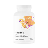 THORNE frasco frontal mostrando etiqueta y cápsulas para digestión