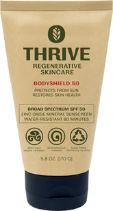 Thrive Natural Care front packaging showing SPF50 and reef safe benefits