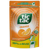 Tic Tac frente del empaque naranja muestra contenido y marca, práctico para recargar