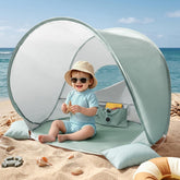 Tiny Land front view beach tent showing full shaded shelter