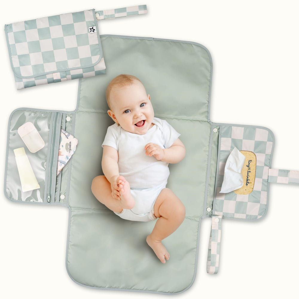 Tiny Twinkle vista frontal del cambiador impermeable, fácil de limpiar
