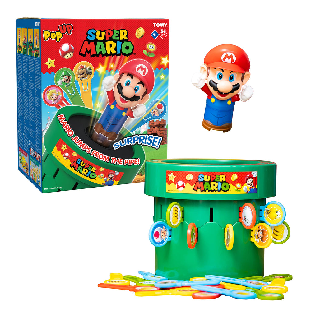 TOMY caja frontal del juego mostrando personajes y piezas, atractivo inmediato