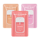 Touchland Juicy Trio front packaging showing three travel bottles and scents