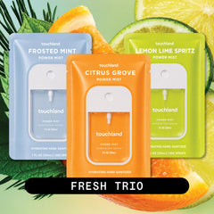 Touchland three-spray set arranged neatly highlighting portability benefit